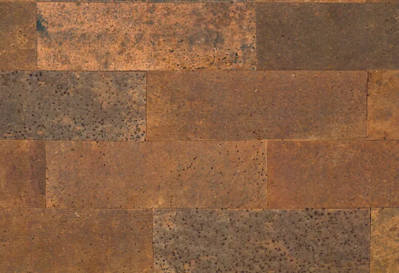 Rechteckige Wandpaneele mit natürlicher Korkstruktur in Braun und Orange.